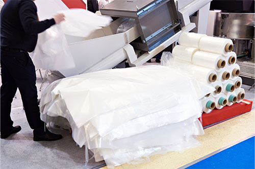 Plastics recycling centers and raw material